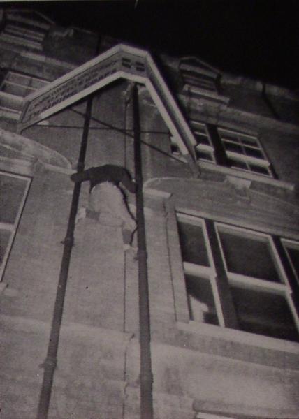 Double Drain-pipe work. The object of the climb is to sign one's name on the white board above.